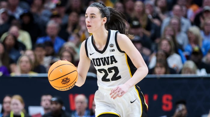 Iowa guard Caitlin Clark dribbles during NCAA women’s basketball championship against LSU